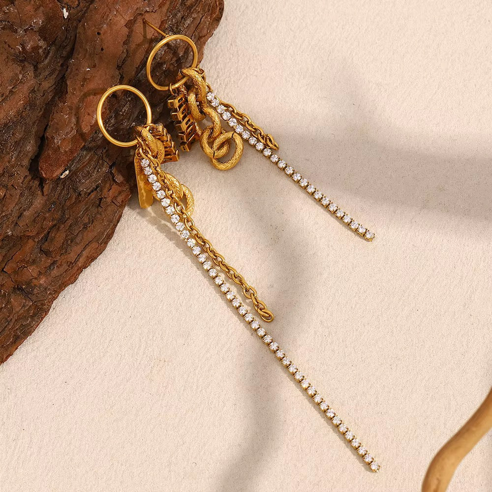 Adaa asymmetric crystal chain earrings by Navera Jewels