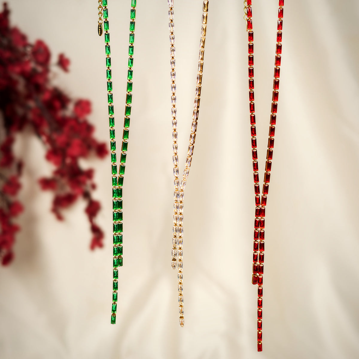 Roshini baguette lariat necklace in emerald green, clear and ruby red – Navera Jewels